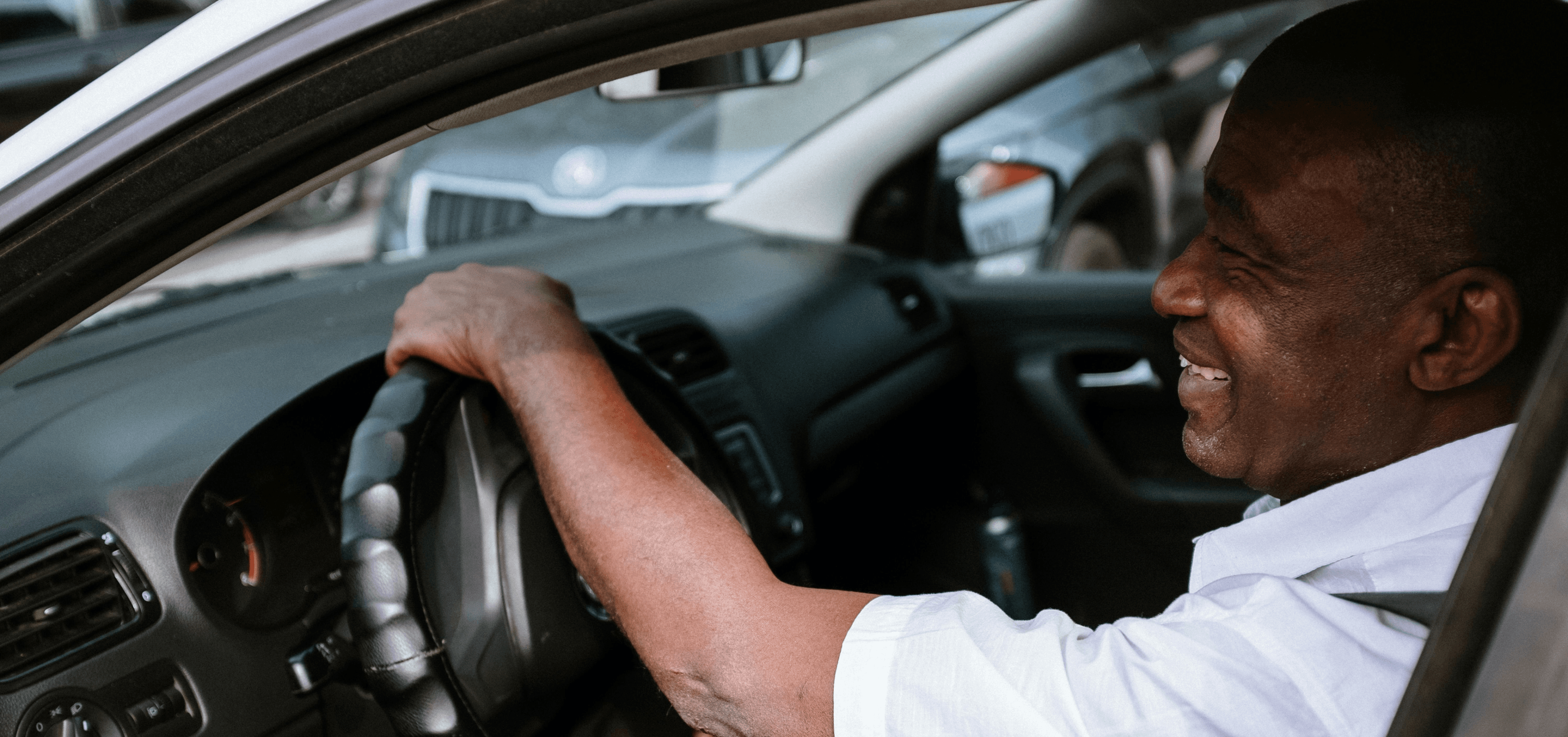 Smiling driver in a car